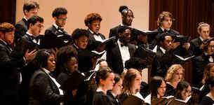 USA's Concert Choir is shown performing on the Laidlaw stage.